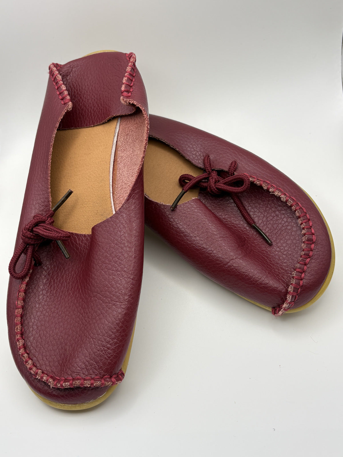 Cozy Burgundy Leather Moccasins with Handstitched Detailing